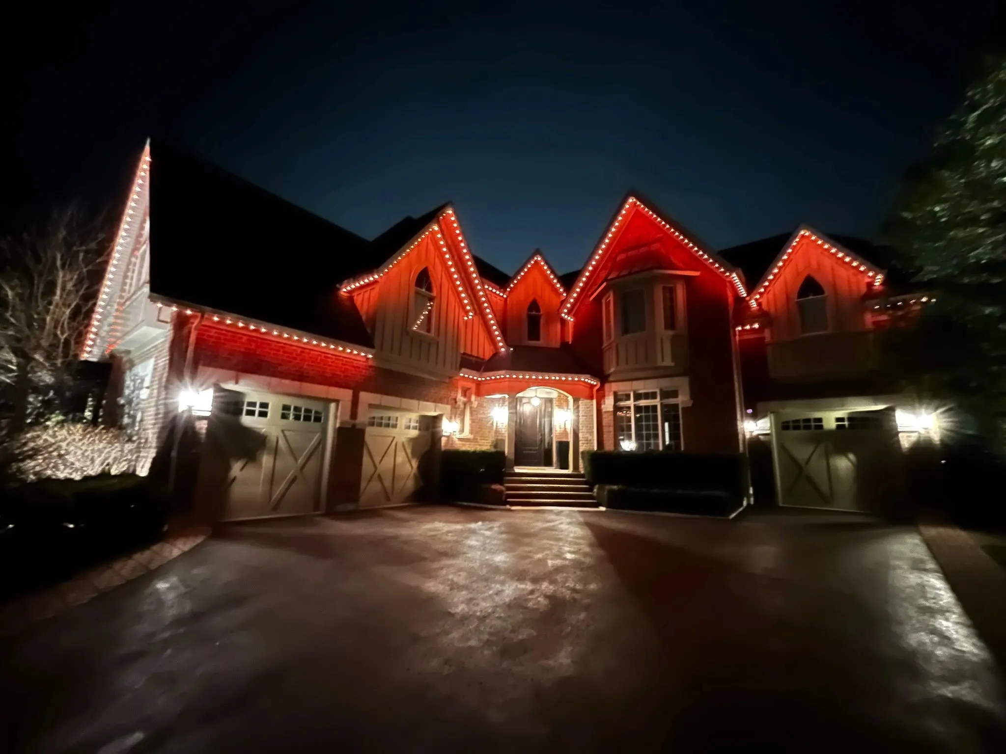 GTA home with smart exterior lighting in red installed by Toronto Glow