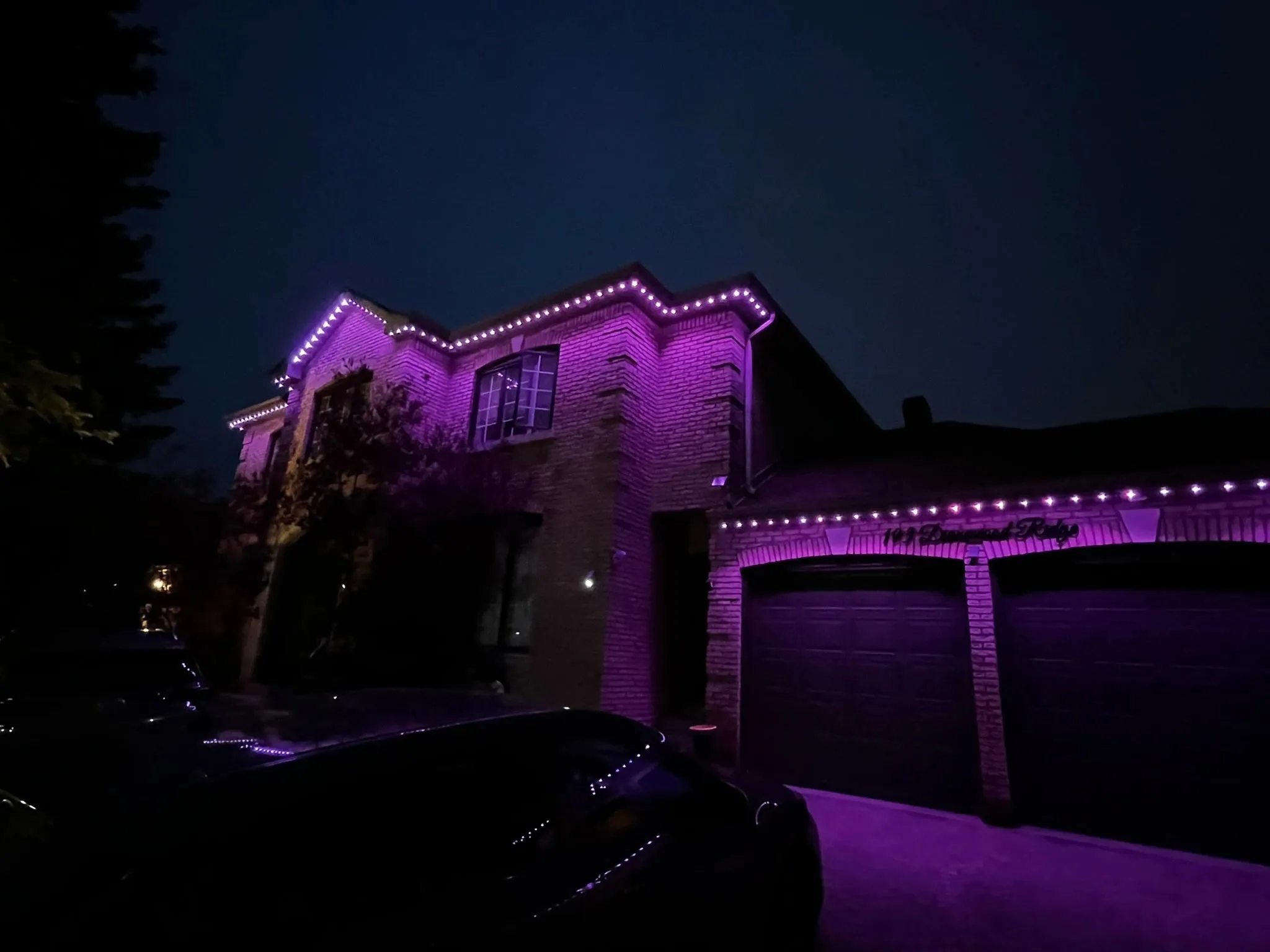 GTA home with permanent soffit lighting in warm white installed by Toronto Glow