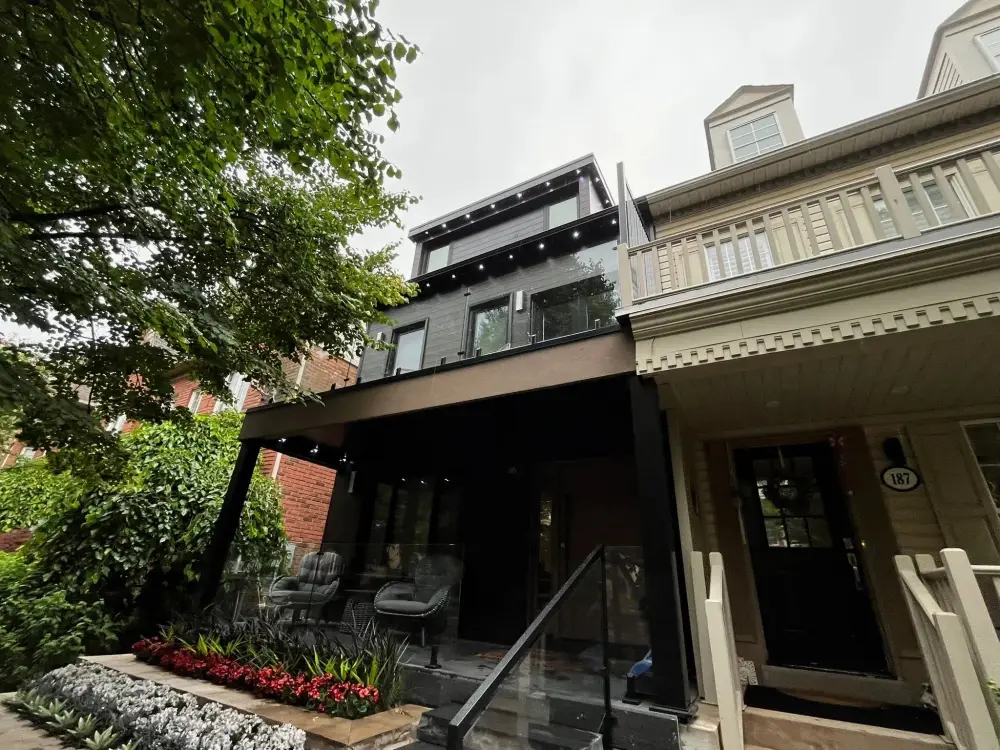 Outdoor track lighting installed along roofline fascia by Toronto Glow