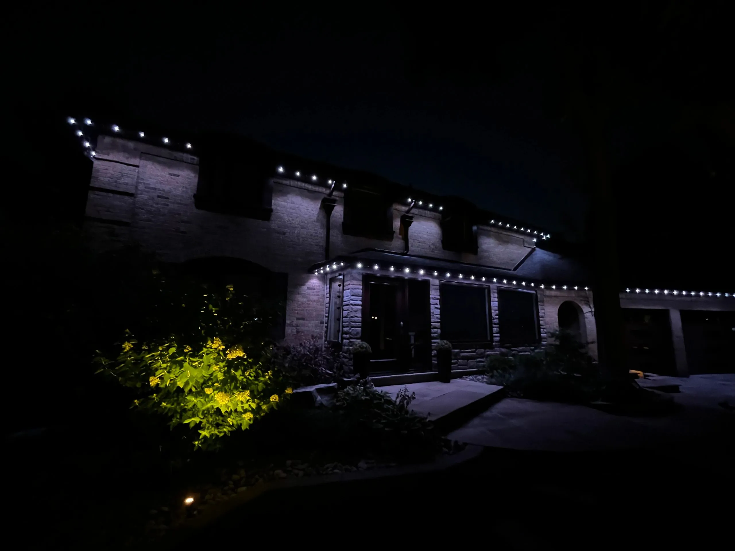 GTA home with permanent outdoor LED lighting in warm white installed by Toronto Glow