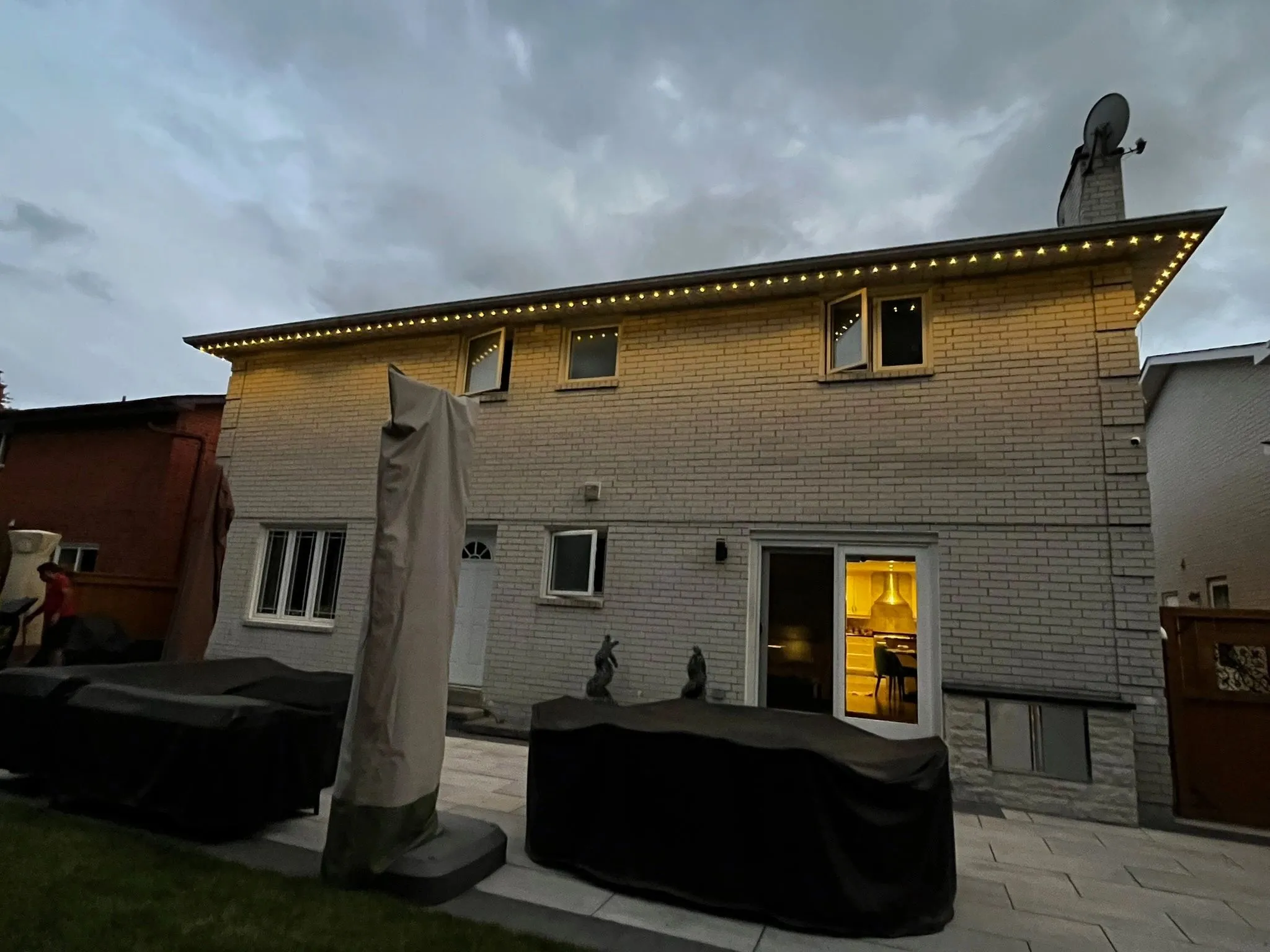 Toronto home with permanent outdoor LED lighting in warm white installed by Toronto Glow
