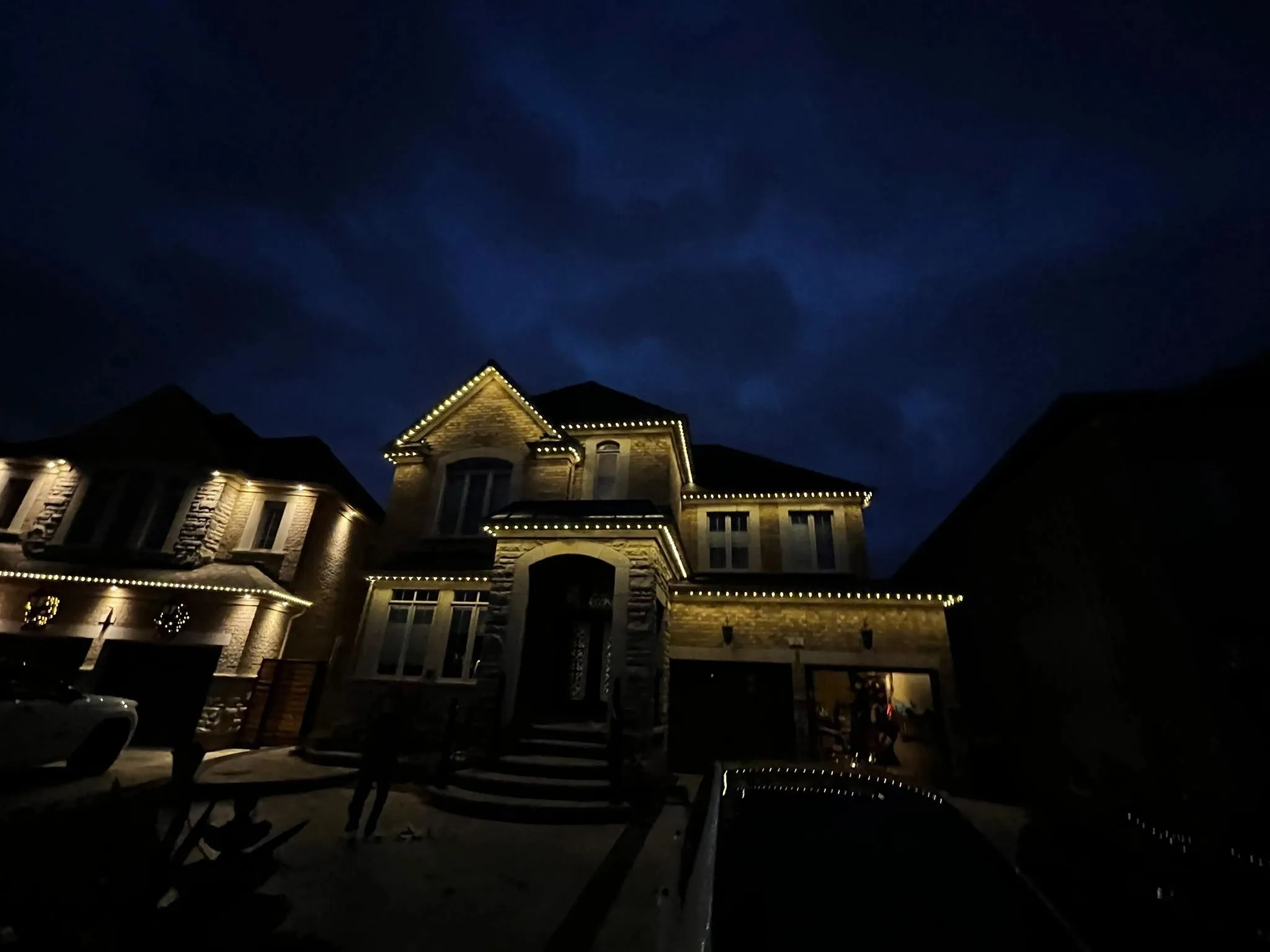 Toronto home with permanent outdoor LED lighting in pink installed by Toronto Glow