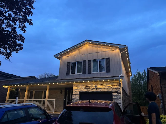 GTA home with permanent soffit lighting in warm white at dusk installed by Toronto Glow