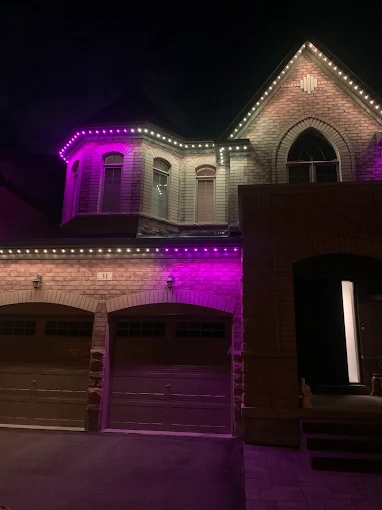 GTA home with permanent outdoor LED lighting in pink and magenta installed by Toronto Glow