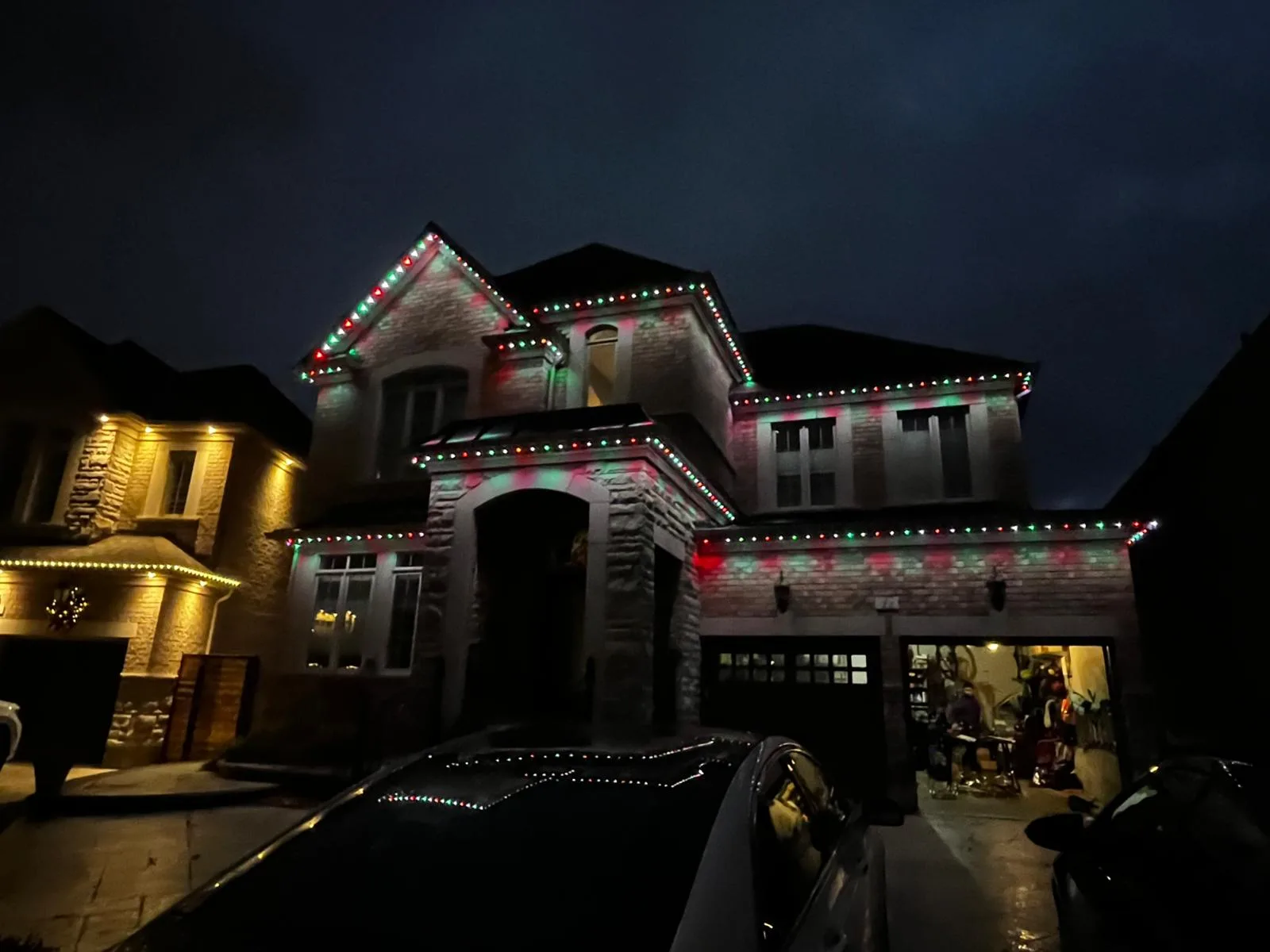 GTA home with red and green permanent Christmas LED lights by Toronto Glow