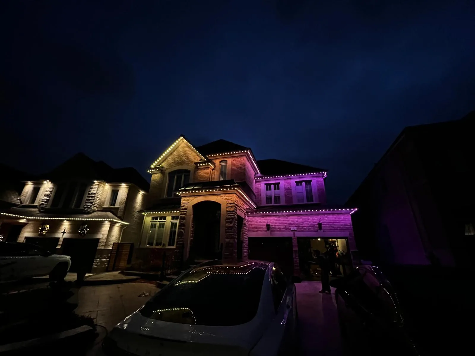 GTA home with warm white and pink permanent LED lights by Toronto Glow